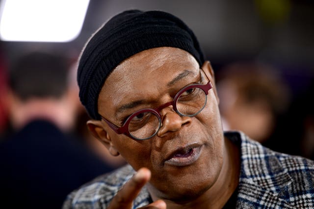 Samuel L Jackson wearing a beanie hat and glasses