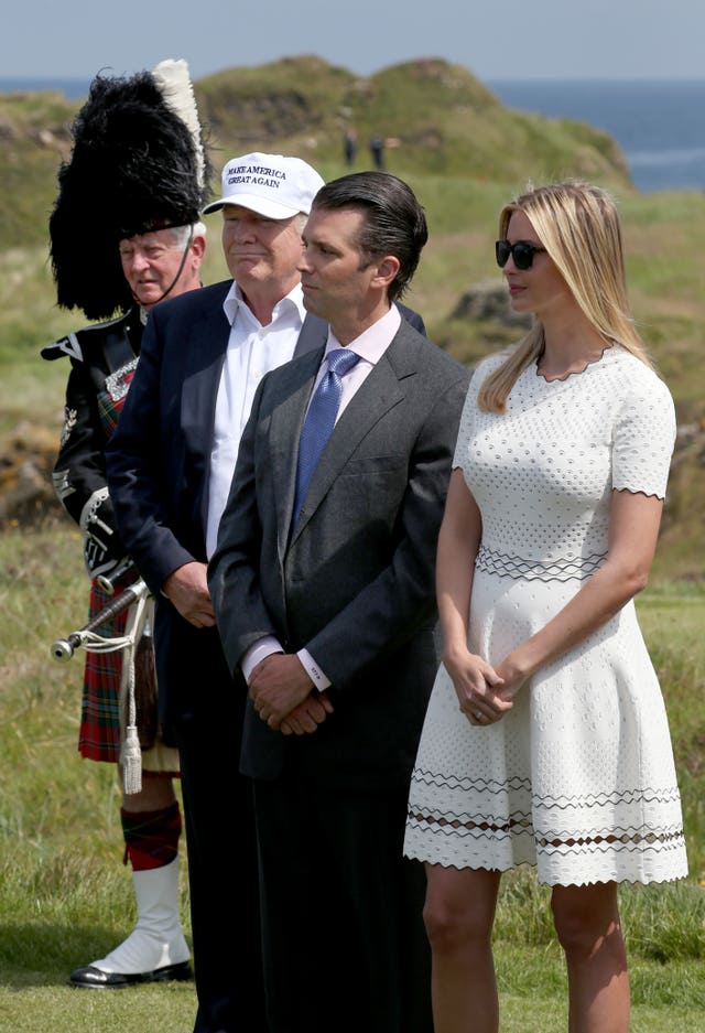 Donald Trump, with his daughter Ivanka and son Donald Trump Jr (Jane Barlow/PA)