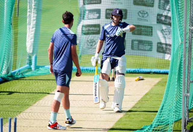 Josh Tongue (left) bowls at Joe Root in the Lord's nets.