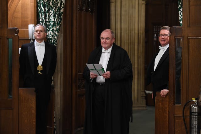 The European Union (Withdrawal Agreement) Bill being carried between the two Houses of Parliament by the Clerk of Legislation Liam Laurence Smyth