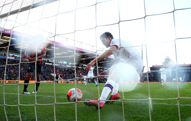 Alonso collects the ball from the net after scoring his side’s second goal