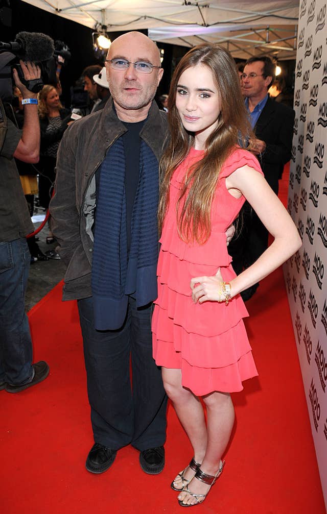 Phil Collins and daughter Lily  in 2008