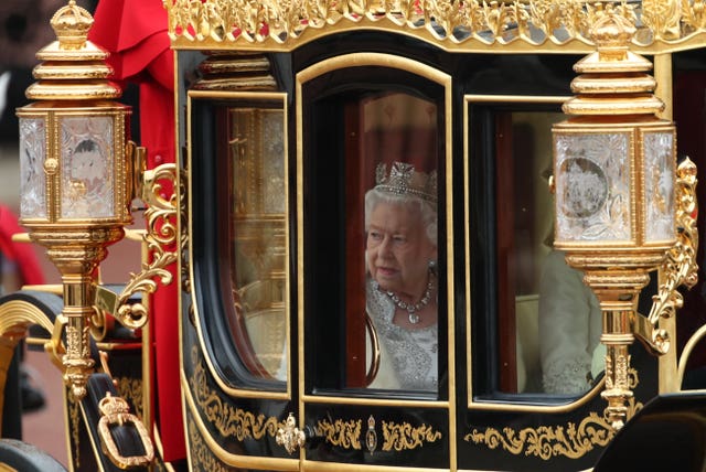 The Queen travels in the Diamond Jubilee State Coach