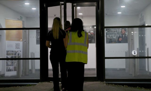 People entering the JLR factory entrance