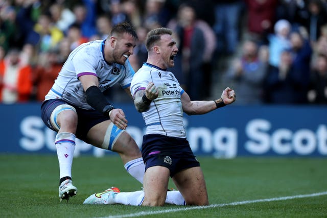 Stuart Hogg celebrates his try