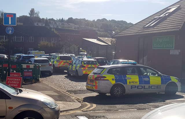 Police cars outside Fir Vale School in Sheffield