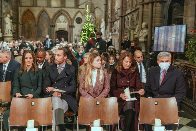 File photo dated 8/12/2021 of the Princess of Wales' family, including her parents, Michael (right) and Carole (second right), and her sister and brother, Pippa Matthews and James Middleton (both left) take their seats ahead of the Together At Christmas community carol service at Westminster Abbey in London