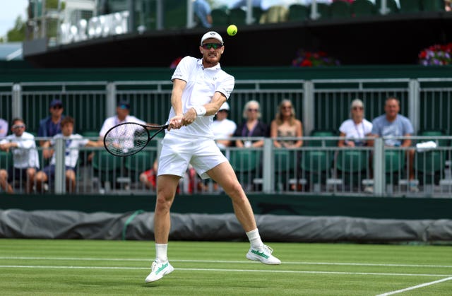 Jamie Murray in action at Wimbledon 