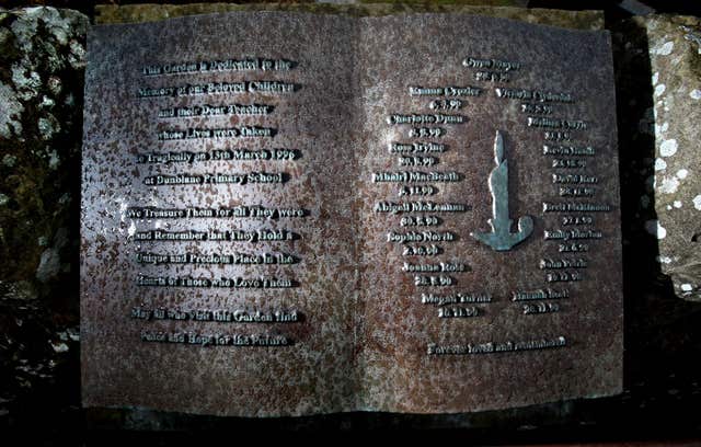 A memorial plaque at the entrance to the Garden of Remembrance at Dunblane Cemetery (Andrew Milligan/PA)