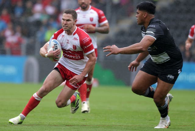 Matt Parcell runs with the ball under his right arm during the Hull derby