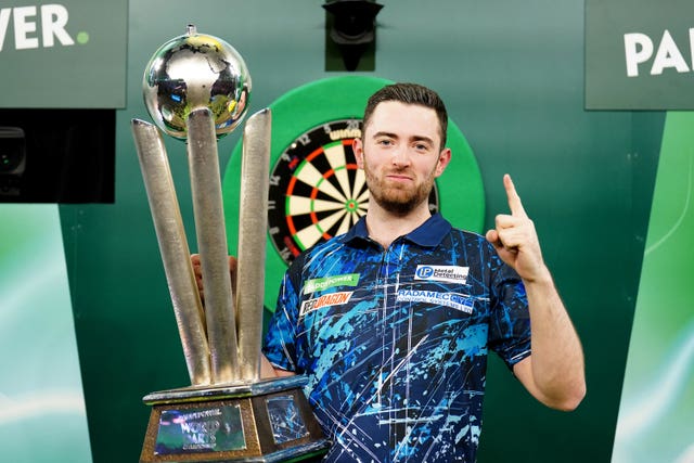 Luke Humphries celebrates winning the World Darts Championship