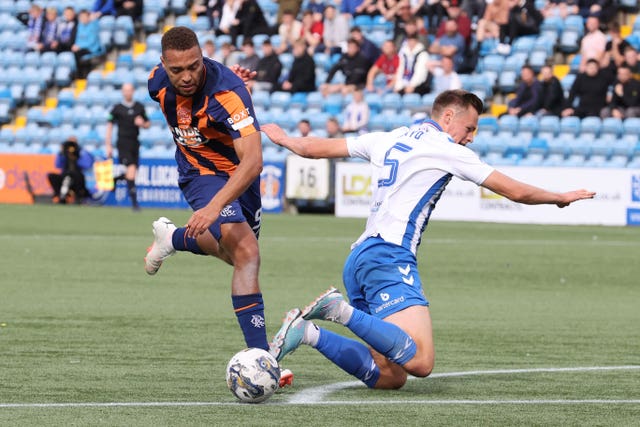 Rangers striker Cyriel Dessers is denied by Kilmarnock defender Lewis Mayo