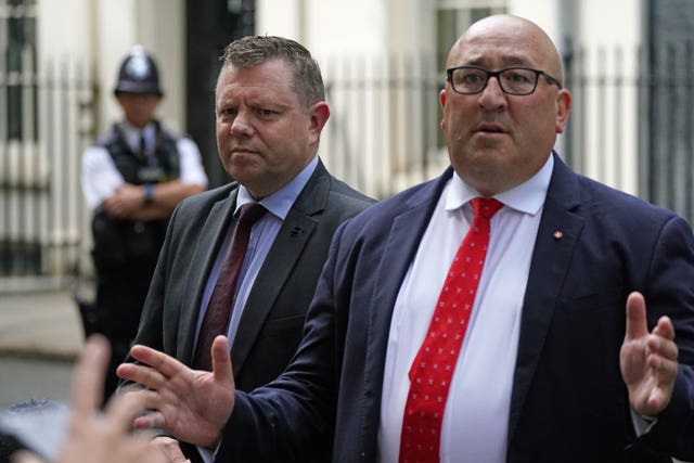 Former chairman of the police federation of England and Wales John Apter and chairman of the Metropolitan Police Federation Ken Marsh speaking to journalists outside Downing Street. 