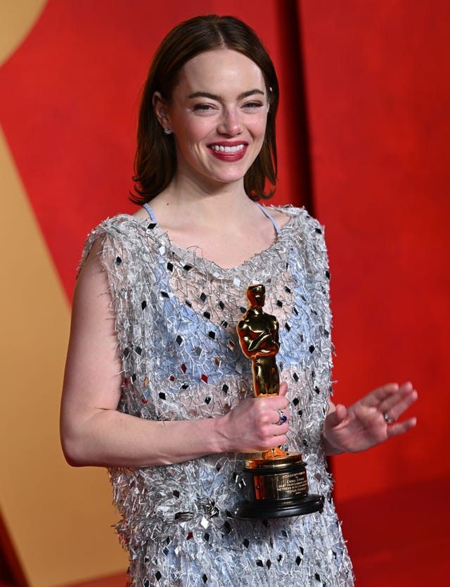 Emma Stone with her best actress Oscar for Poor Things in 2024 