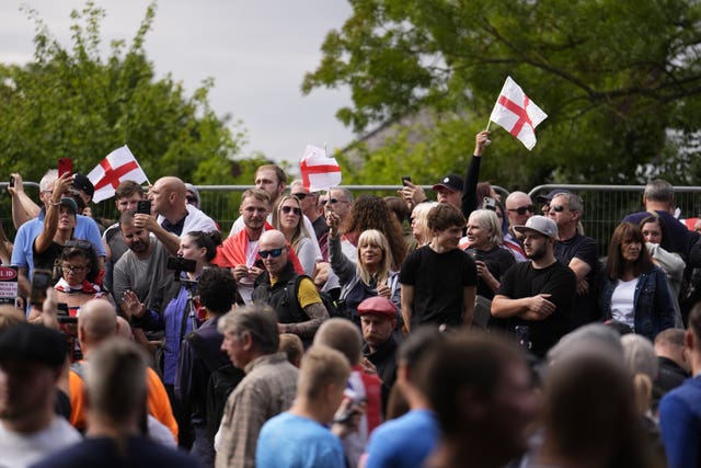 Protesters outside the Bell Hotel in Epping. (Jordan Pettit/ PA)