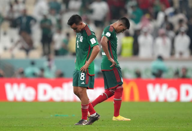 Mexico’s Carlos Rodriguez (left) and Jesus Gallardo (right) appear dejected after Mexico are eliminated