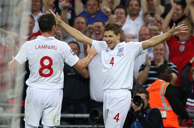 Steven Gerrard, right, celebrates after scoring England's fourth goal at Wembley in 2009
