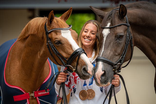 Charlotte Dujardin with her Olympic horses Gio, left, and Valegro