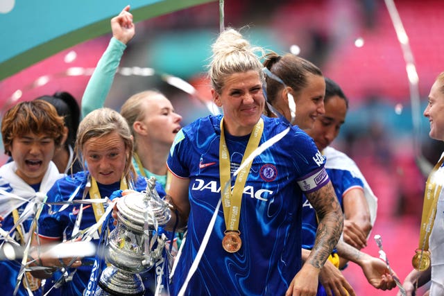 Chelsea’s Millie Bright (centre) with the FA Cup trophy