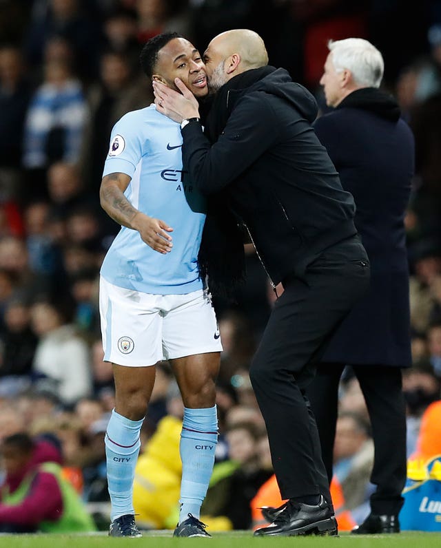 Raheem Sterling, left, and Pep Guardiola