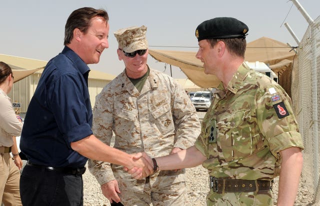 Picture from 2011 of Brigadier Nick Welch OBE, Deputy Commander Regional Command (Southwest) (RC SW), welcoming then prime minister David Cameron to Camp Leatherneck in Afghanistan’s Helmand Province