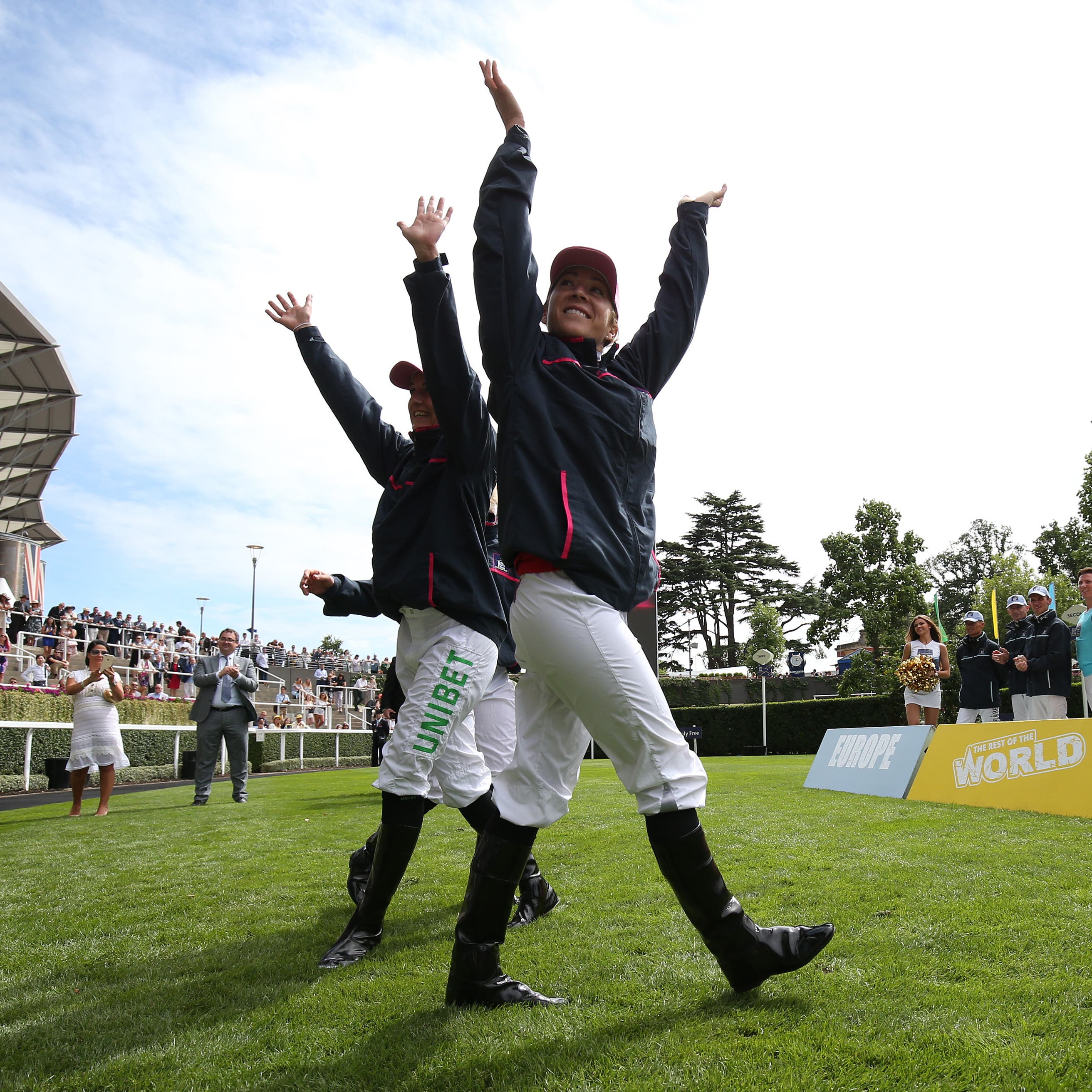 Hayley Turner of The Girls Team heads out to the opening ceremony during the Dubai Duty Free Shergar Cup Day at Ascot
