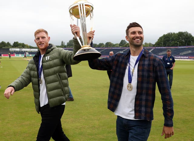 Ben Stokes (left) and Mark Wood parade the World Cup at Durham in 2019 