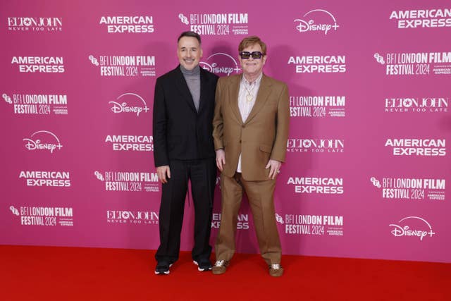 David Furnish and Elton John attend the premiere of Elton John: Never Too Late at this year's American Express Gala for the 68th BFI London Film Festival at London's Royal Festival Hall. 