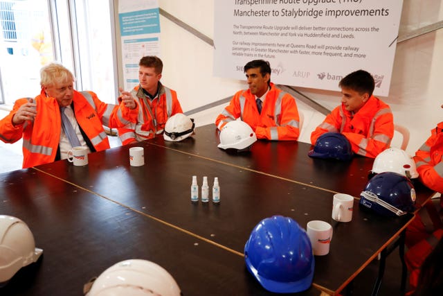 Boris Johnson and Rishi Sunak spoke with apprentices during their visit to see the track improvements being made as part of Northern Powerhouse Rail