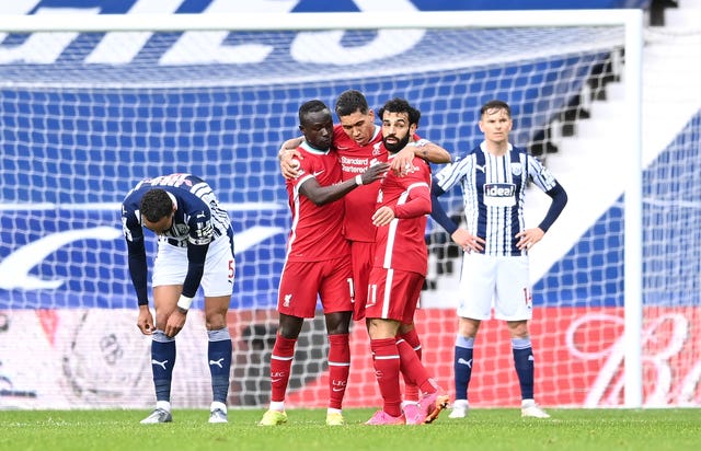 Mohamed Salah celebrates scoring for the visitors