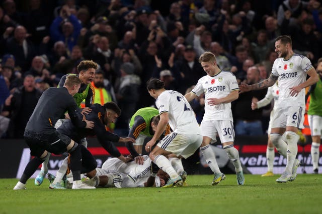 Leeds’s Crysencio Summerville (centre) celebrates with team-mates after scoring a late winner against Bournemouth