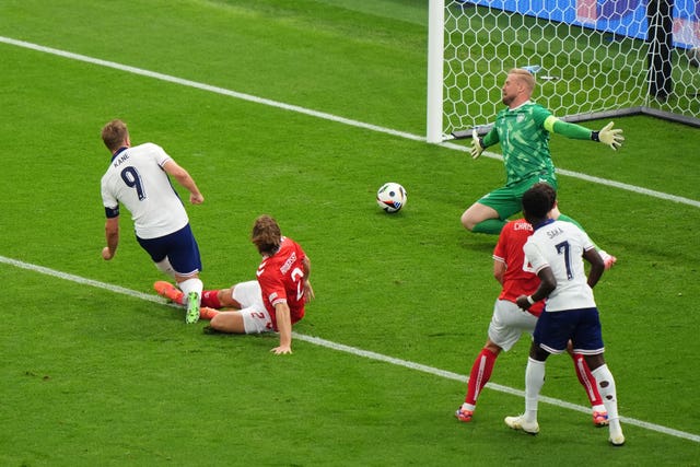 Harry Kane scoring England's opening goal against Denmark in their Euro 2024 match