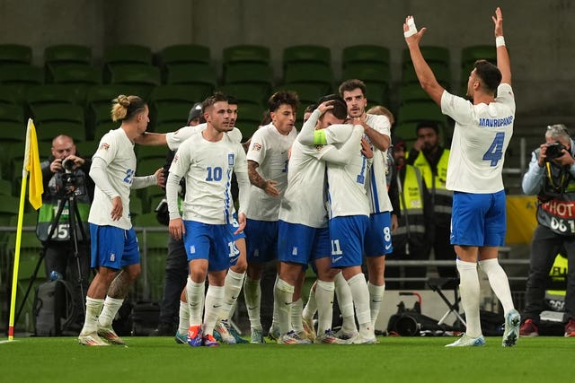 Christos Tzolis, centre, celebrates scoring for Greece against Republic of Ireland