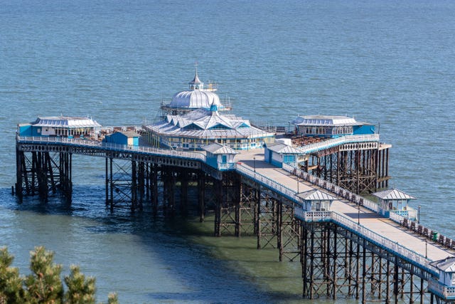 The pier at Llandudno, north Wales, stands empty (Peter Byrne/PA)