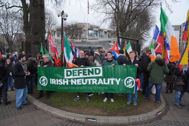 People attend a protest outside the US embassy in Dublin 