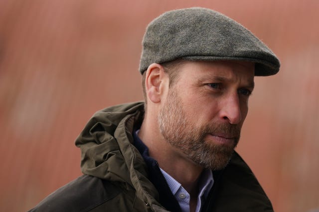 Prince of Wales wearing a flat cap