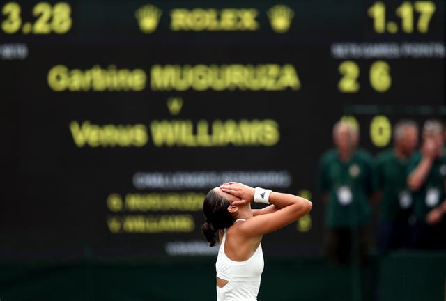 Garbine Muguruza reacts after beating Venus Williams in the Wimbledon final in 2017