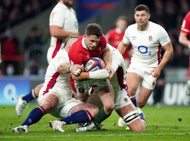 Kieran Hardy forces his way over the try line in Wales' narrow defeat to England 