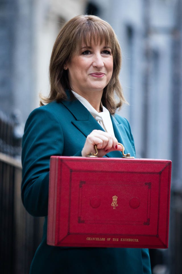Rachel Reeves poses outside 11 Downing Street with her ministerial red box