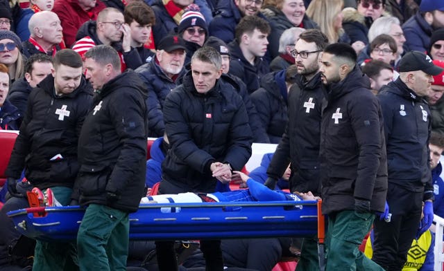 Ipswich manager Kieran McKenna consoles Wes Burns