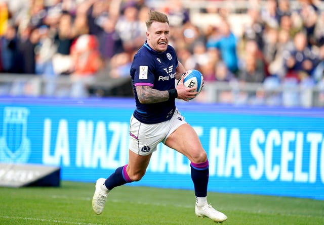 Stuart Hogg runs in a try for Scotland