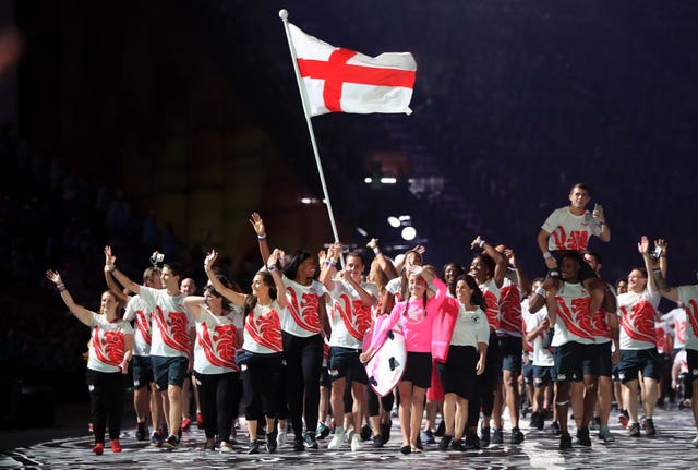 England’s flag bearer Alistair Brownlee leads out his team during the opening ceremony for the 2018 Commonwealth Games