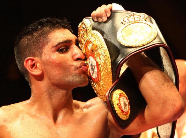 Amir Khan became world champion, aged 22 (Nick Potts/PA)