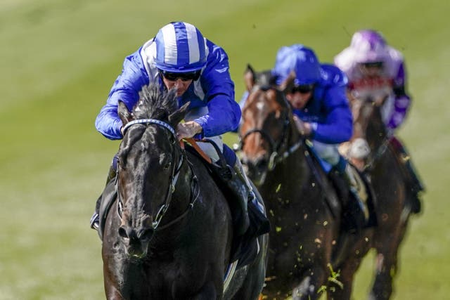 Jockey Jim Crowley riding Mutasaabeq on their way to winning at Newmarket