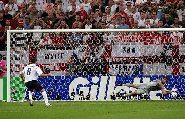 Portugal keeper Ricardo, right, saves from Frank Lampard in 2006