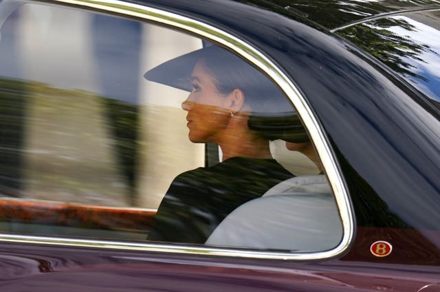 The Duchess of Sussex leaves in a car following the State Funeral of Queen Elizabeth II