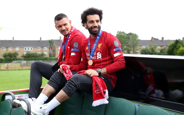 Dejan Lovren and Mohamed Salah show off their medals 
