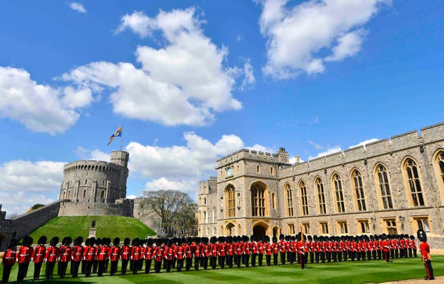 Windsor Castle's quadrangle - pictured hosting a ceremonial welcome for the United Arab Emirates President - will host the new event marking the Queen's official birthday. Toby Melville/PA Wire