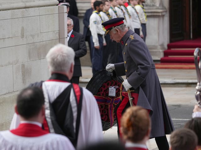 Charles lays a wreath