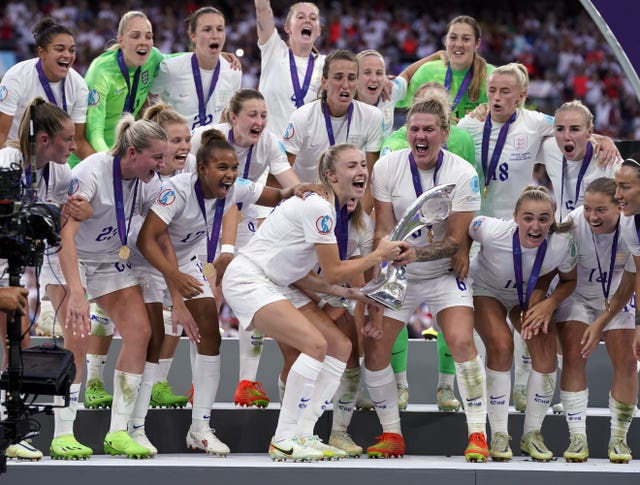 England's women's team celebrate beating Germany to become European champions 